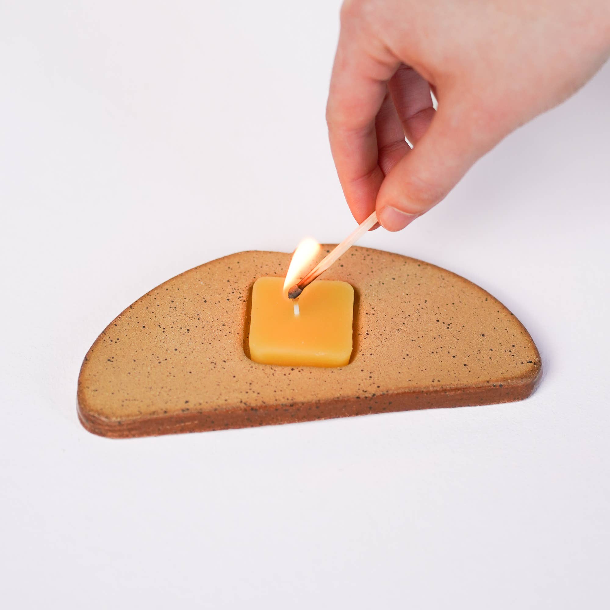 ceramic toast with butter candle holder