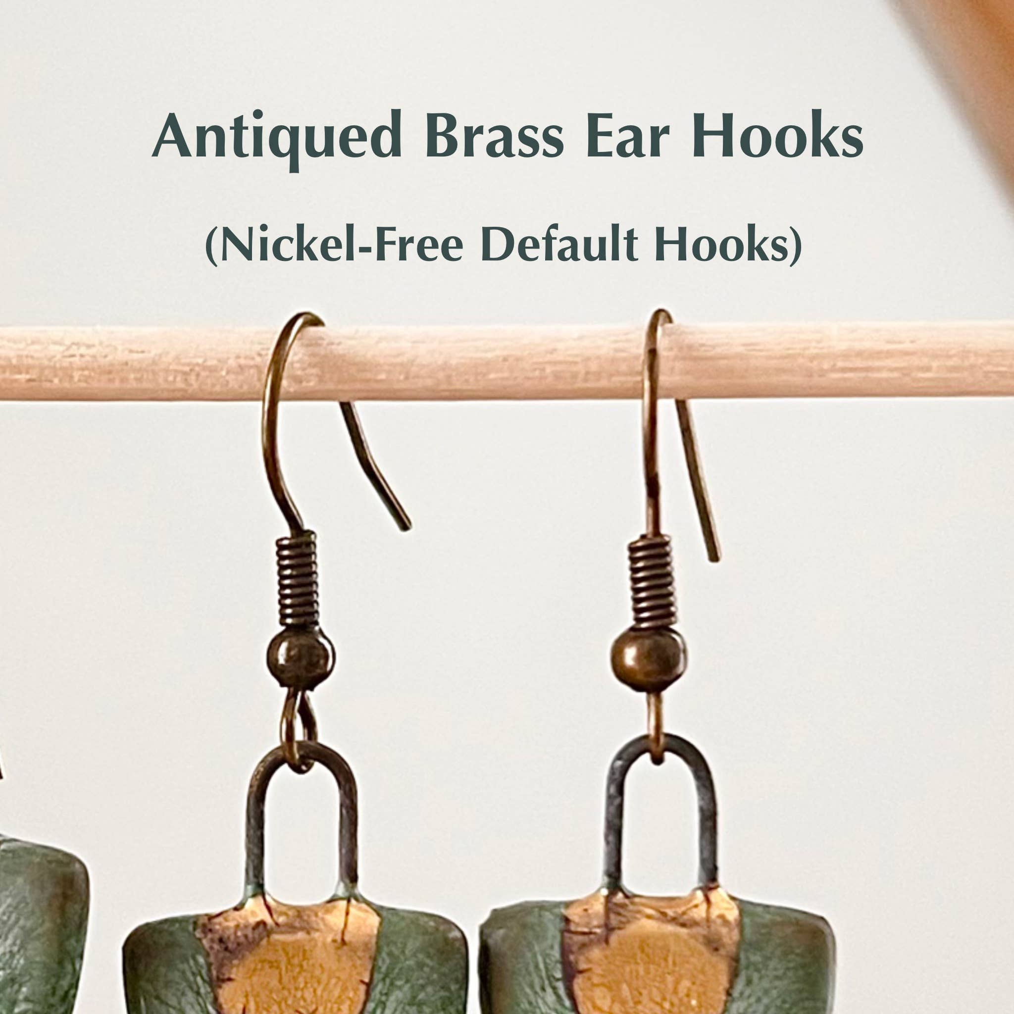 Antiqued Brass Ear Hooks showcased with Turquoise and Gold Collar Earrings by The Artifact House, highlighting the nickel-free default hooks in a clean and styled setting.