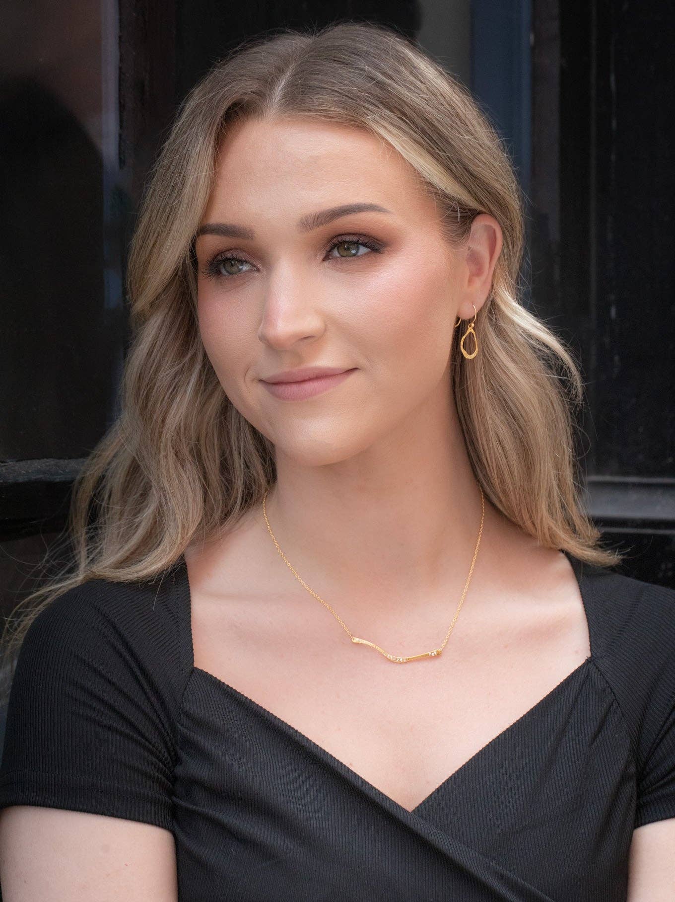 Nina Earrings showing their subtle abstract design - perfect for when you want your accessories to outshine your personality (but good luck with that!)!