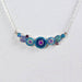 Bold Geometric Round Necklace In Crystal & Silver - Stunning modern statement jewelry by Mosaico, showcasing a distinctive round design with shimmering crystals.