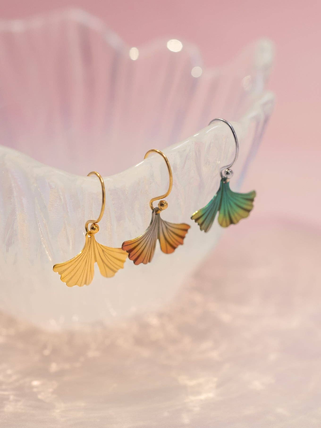 Petite Ginkgo Earrings hanging delicately, ready to dance off to an island getaway (or just to your next Zoom call!).