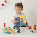 Girl playing with Wooden Animal Town Building Blocks