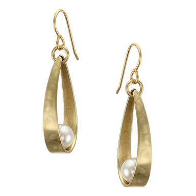 Long Loop with White Pearl Wire Earring by Marjorie Baer showcasing a hammered brass loop and a single white pearl.