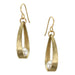Long Loop with White Pearl Wire Earring by Marjorie Baer showcasing a hammered brass loop and a single white pearl.