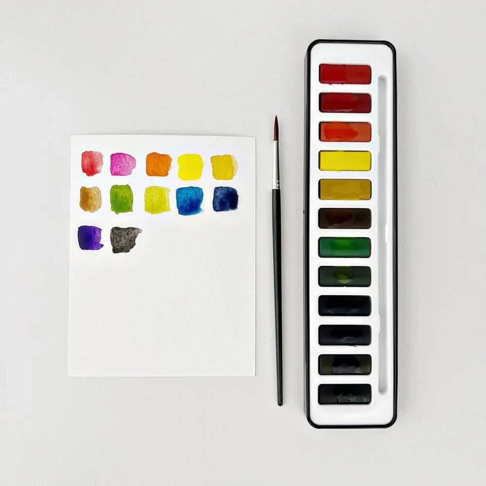 Watercolor paint set 12 colors in a stylish black tin case, perfect for artists on the go.