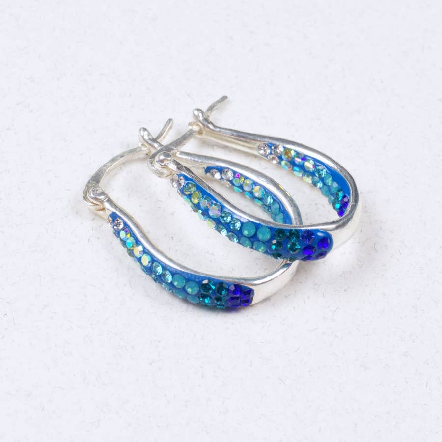 Crystal Small Hoop Earring by Mosaico Jewels featuring vibrant blues and shimmering crystals set in a silver hoop design.