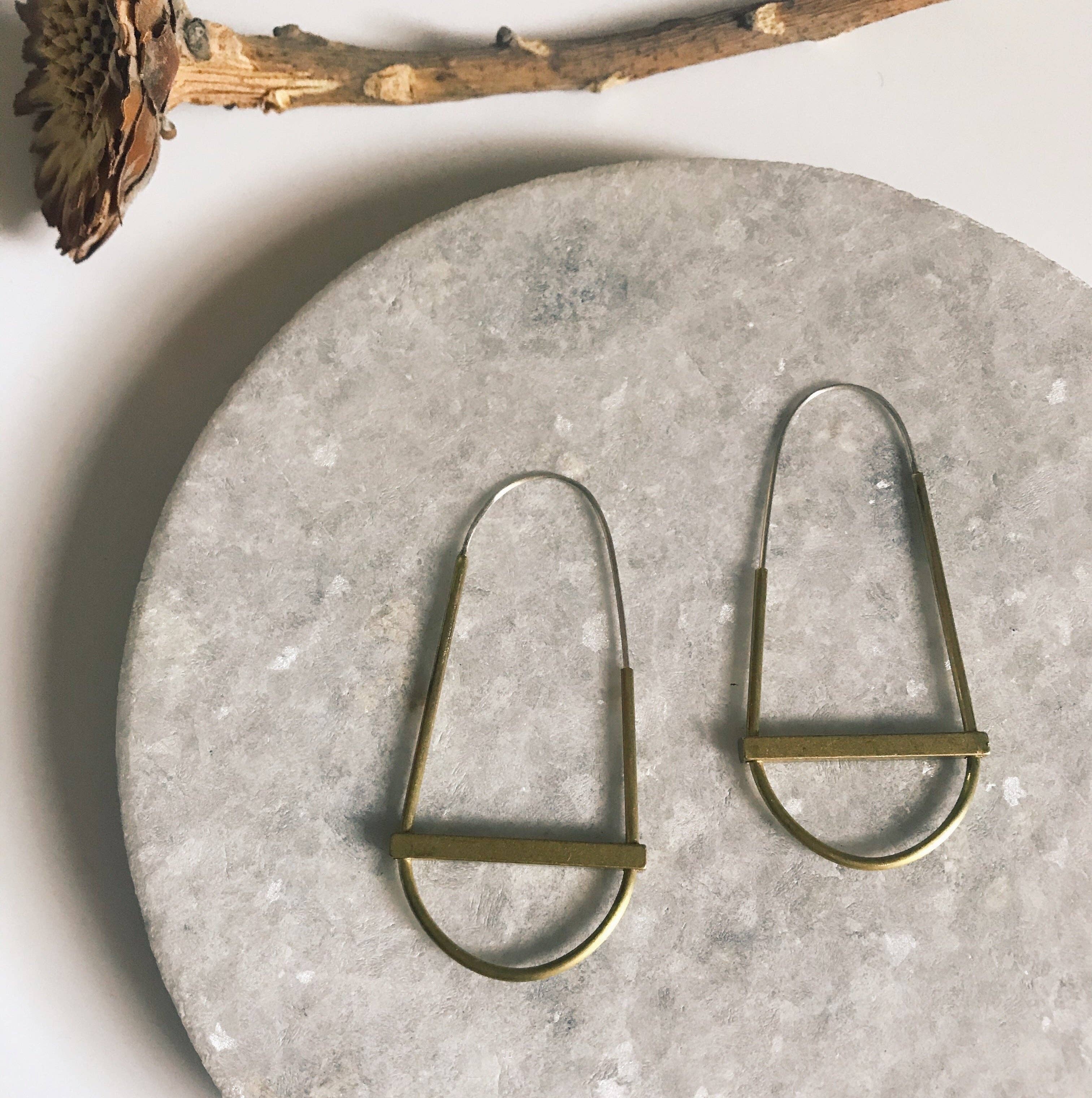 gold hollow hoop with crossbar earrings