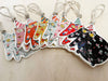 Party Cat Ornament with Colorful Party Hat: Black hanging decor featuring a festive cat design, perfect for year-round celebrations.