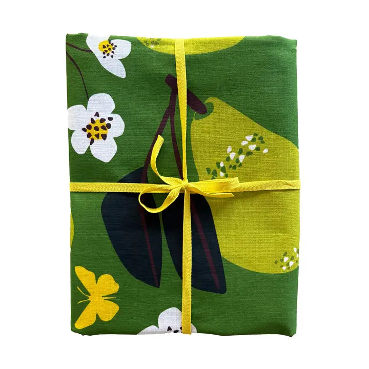 Elegant Elizabeth Grubaugh Tablecloths that enhance dining experiences with a lovely blue echinacea floral pattern, machine washable for convenience.