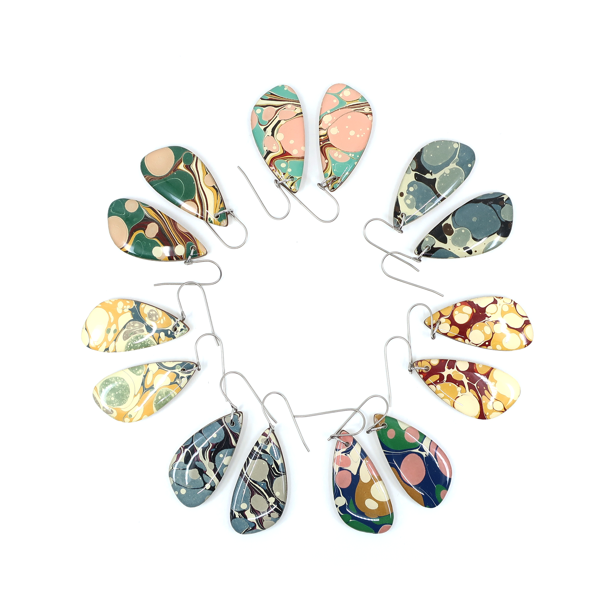 Mint green and pink modern marble dangle earrings made with hand-marbled UK paper and finished with UV-cured resin, featuring nickel-free titanium wire hooks for sensitive ears.
