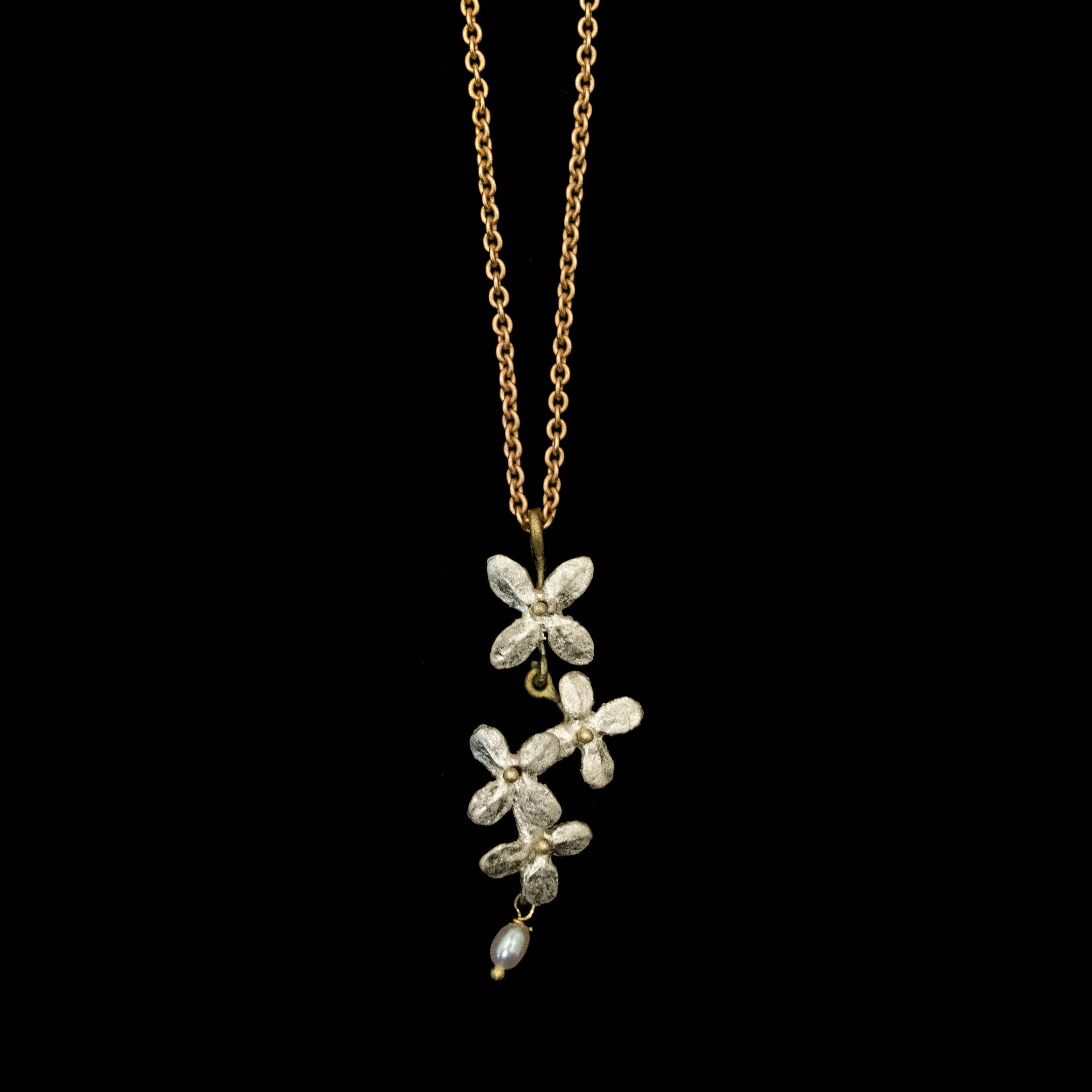 Elegant White Hydrangea 16" Adjustable Pendant jewelry by Michael Michaud, showcasing intricate floral design in bronze with a silver plated finish and 22K white gold leaf.