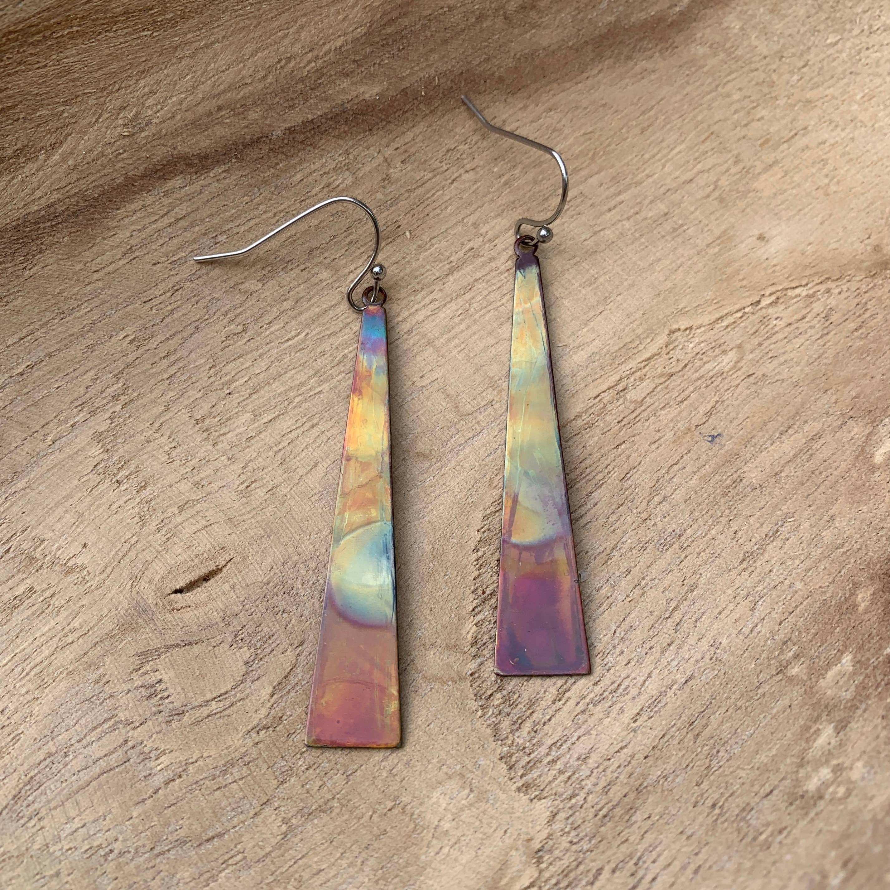 Stylish Triangle Stick Earrings displayed on a model, showcasing their lightweight feel and eye-catching design.