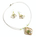 wire necklaces and earrings featuring green beads and acrylic gemstones
