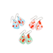 Mint blue goldfish titanium dangle earrings displayed elegantly, emphasizing their lightweight design and hypoallergenic titanium hooks.