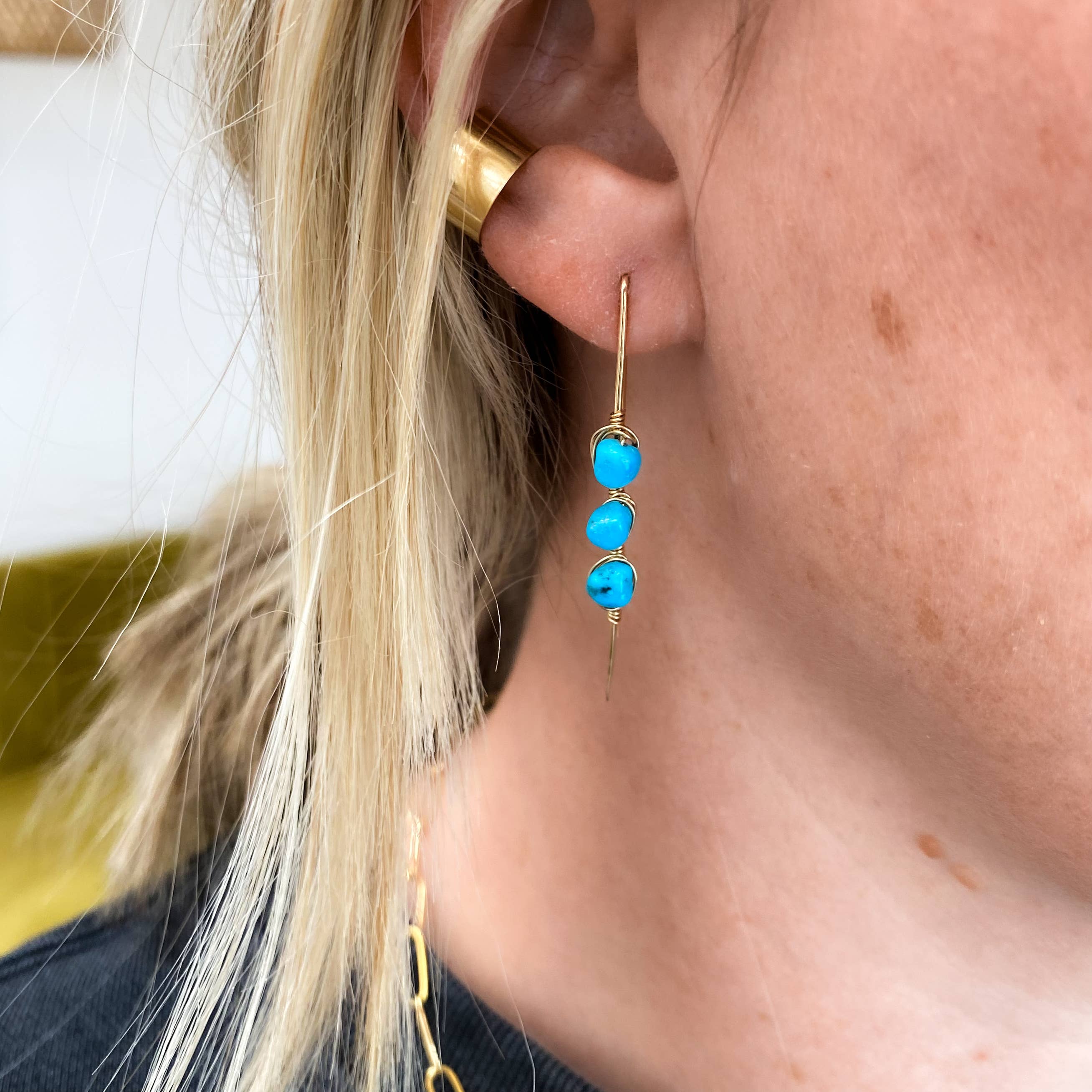 Woman wearing Threader Earrings with Turquoise
