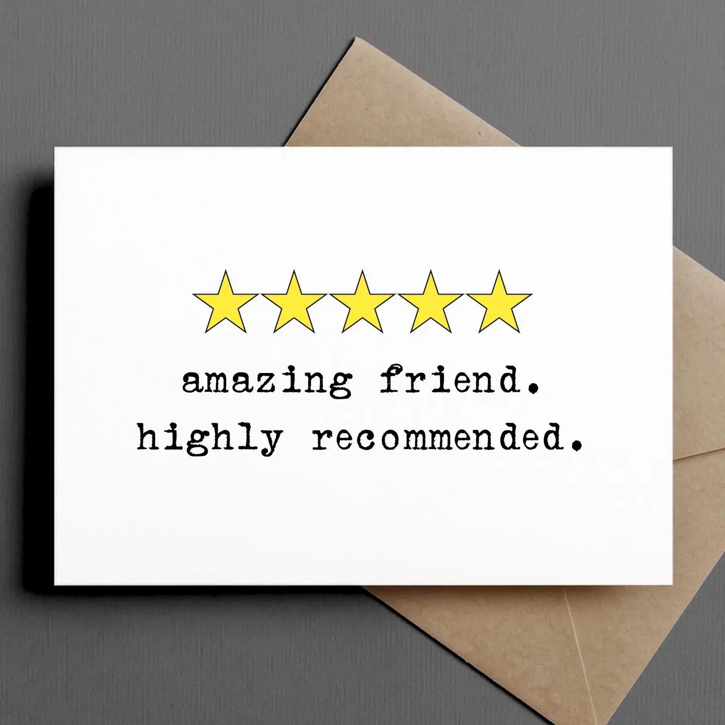 A humorous greeting card from Ink & Attitude Card Collection featuring five yellow stars and the text 'amazing friend. highly recommended.' showcasing a lighthearted sentiment.
