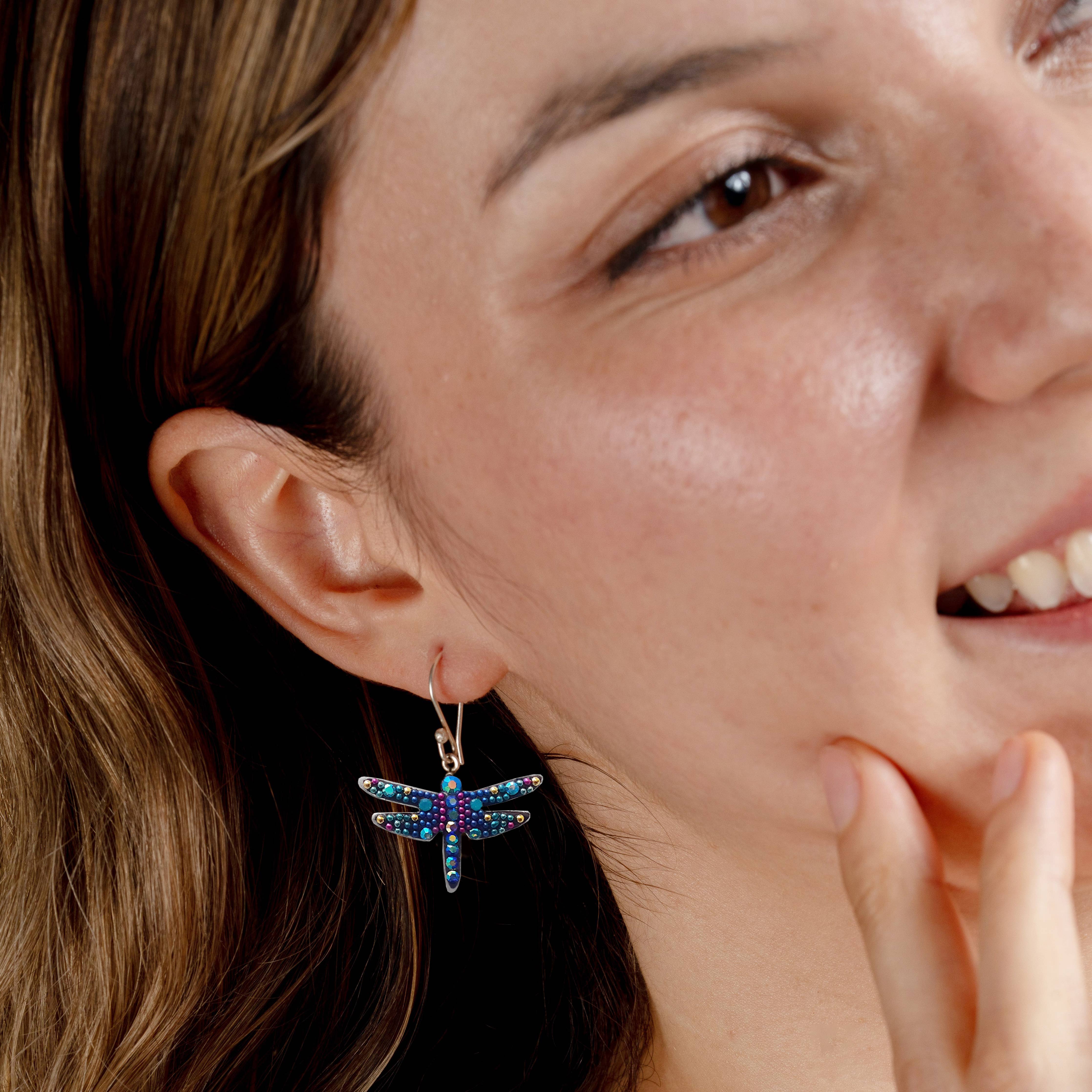 Close-up view of Mystic Dragonfly Earrings showcasing their magical design and intricate details.