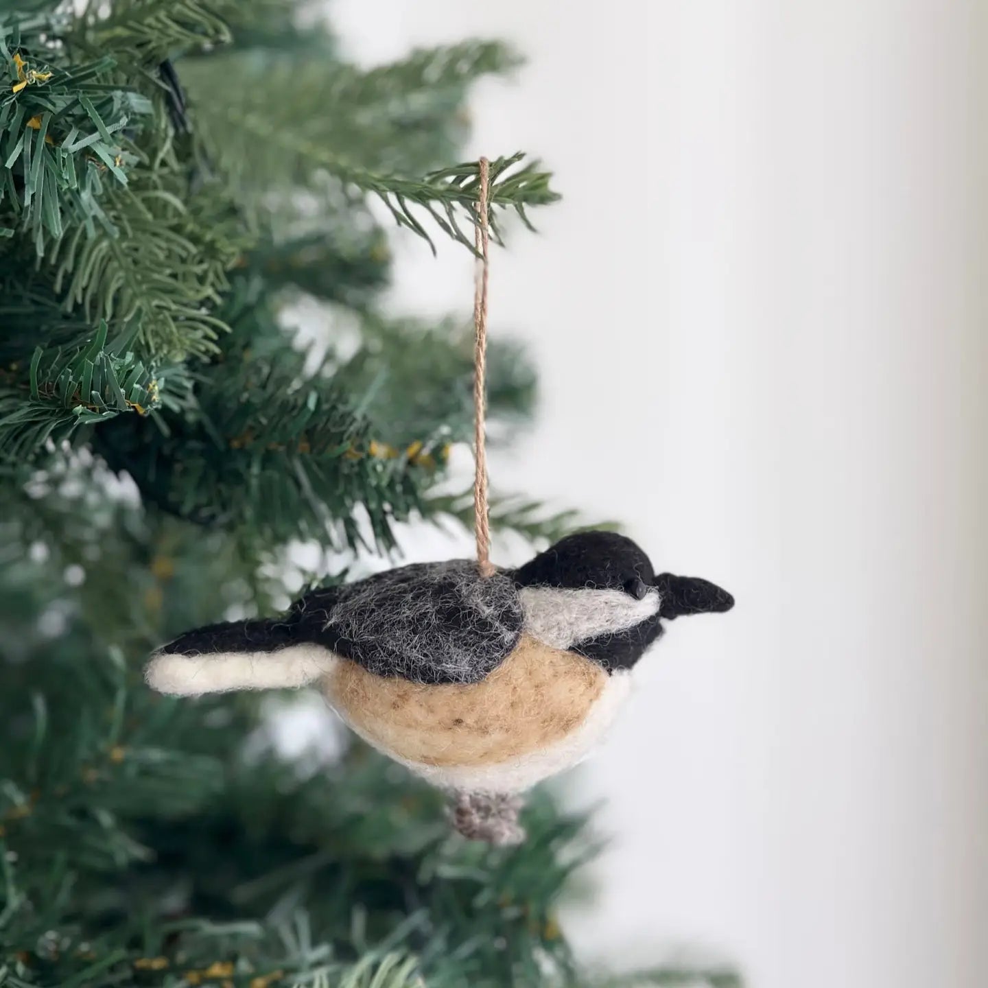 Charming Felt Bird Ornaments, designed in Florida and handmade in Nepal, bringing joy to your holiday season.