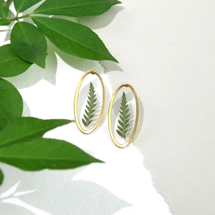 Oval post earrings with fern