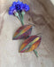 Close-up of Botanical Large Leaf Fire Painted Copper Earrings, featuring intricate copper detailing and stainless steel ear wires, a perfect gift symbolizing love and beauty.