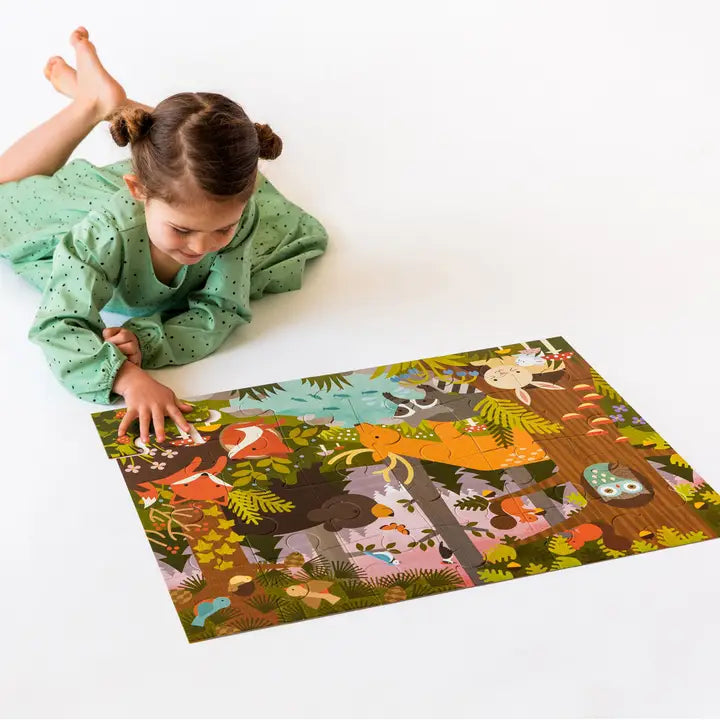 Little girl with large puzzle