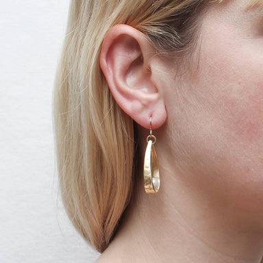 Elegant Long Loop with White Pearl Wire Earring featuring brass craftsmanship and a stunning white pearl detail.
