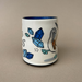 Ridiculous Dance Spark Cup - Large by The Bowl Maker highlighting a side view of a beautifully decorated cup with a bird and blue gem motifs.