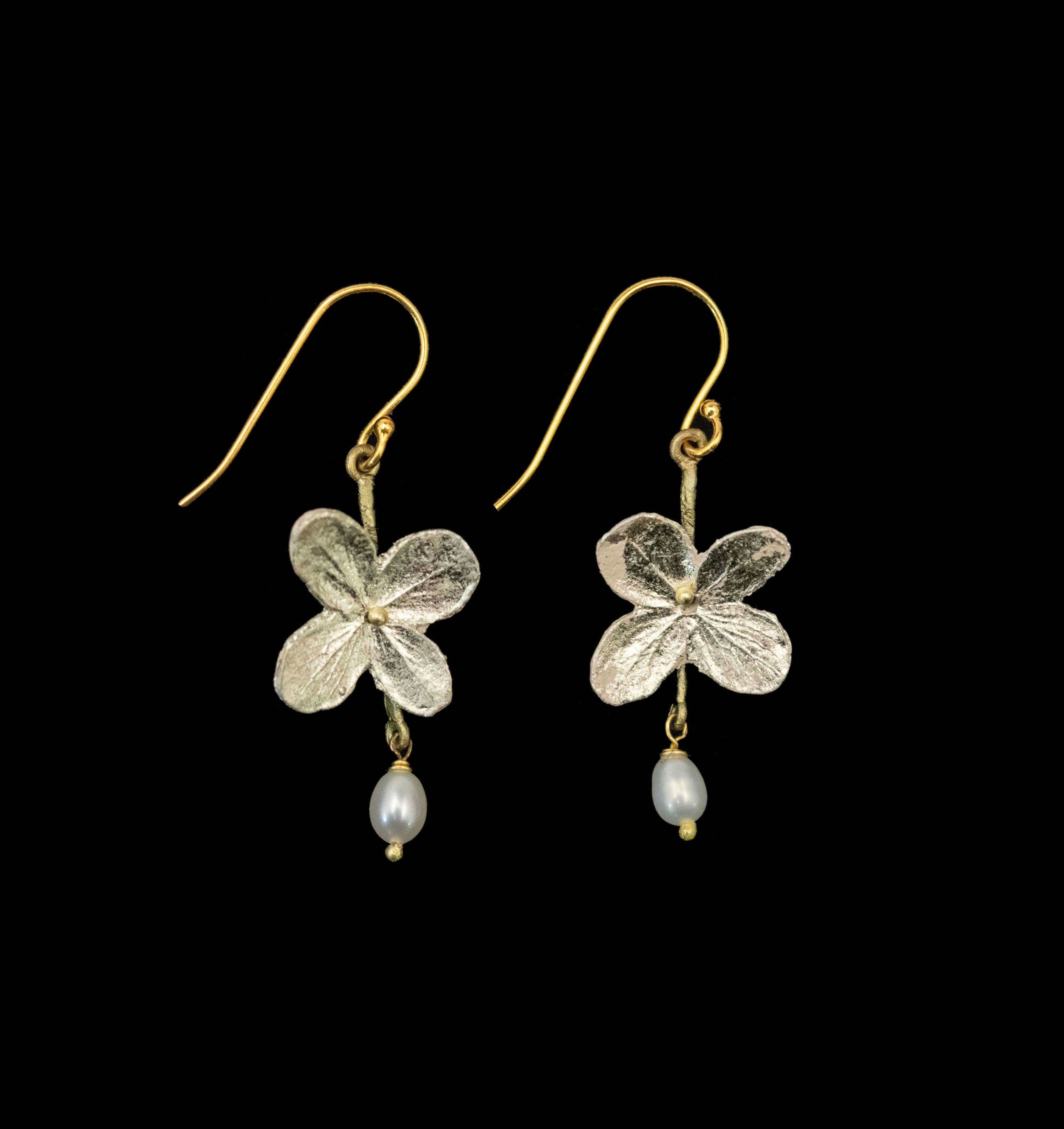 Elegant White Hydrangea Single Flower Wire Earrings by Michael Michaud, featuring a bronze silhouette with a silver plated finish and adorned with a delicate 22K white gold leaf, complemented by a soft pearl drop.