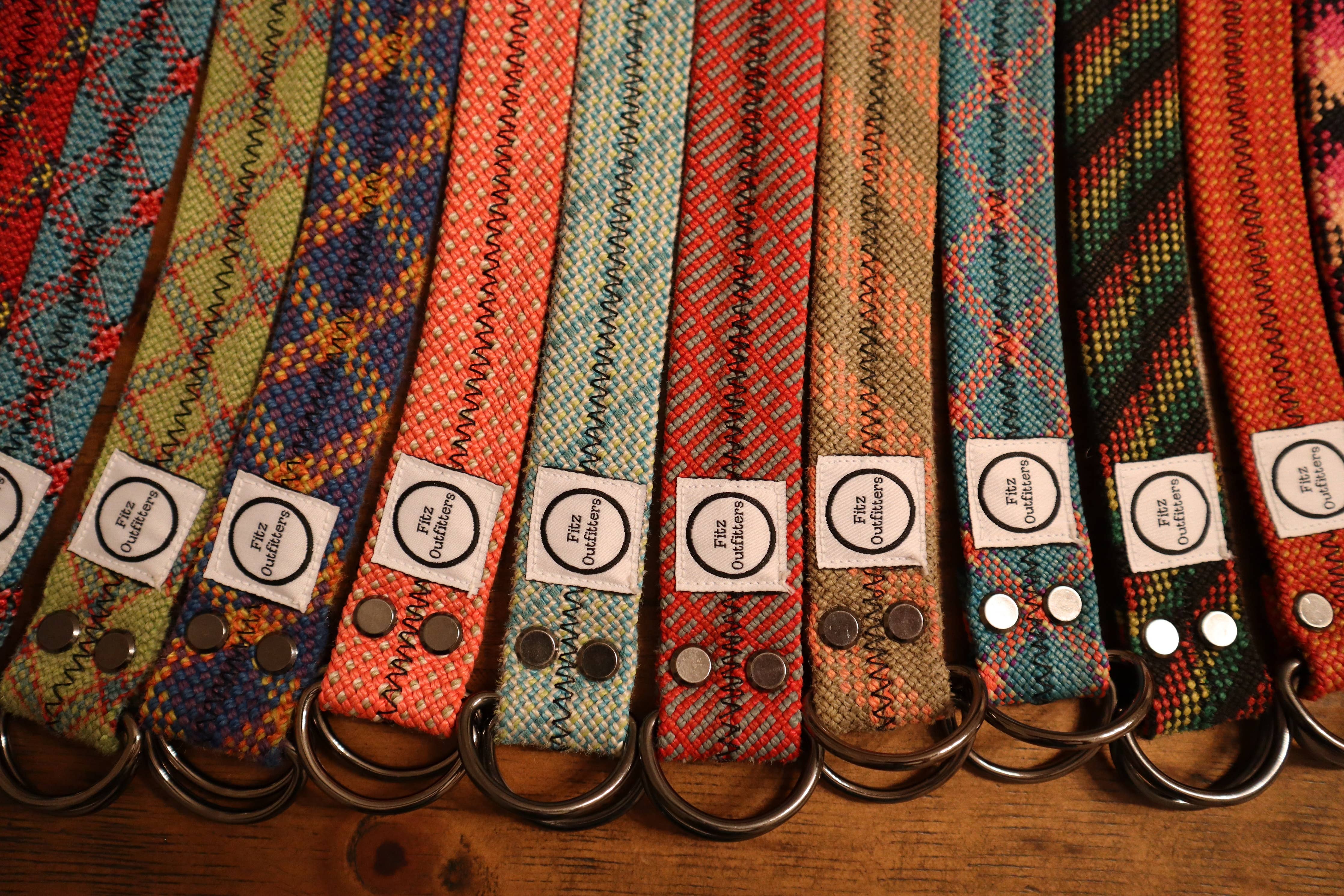 Belts made from retired climbing rope in assorted colors.