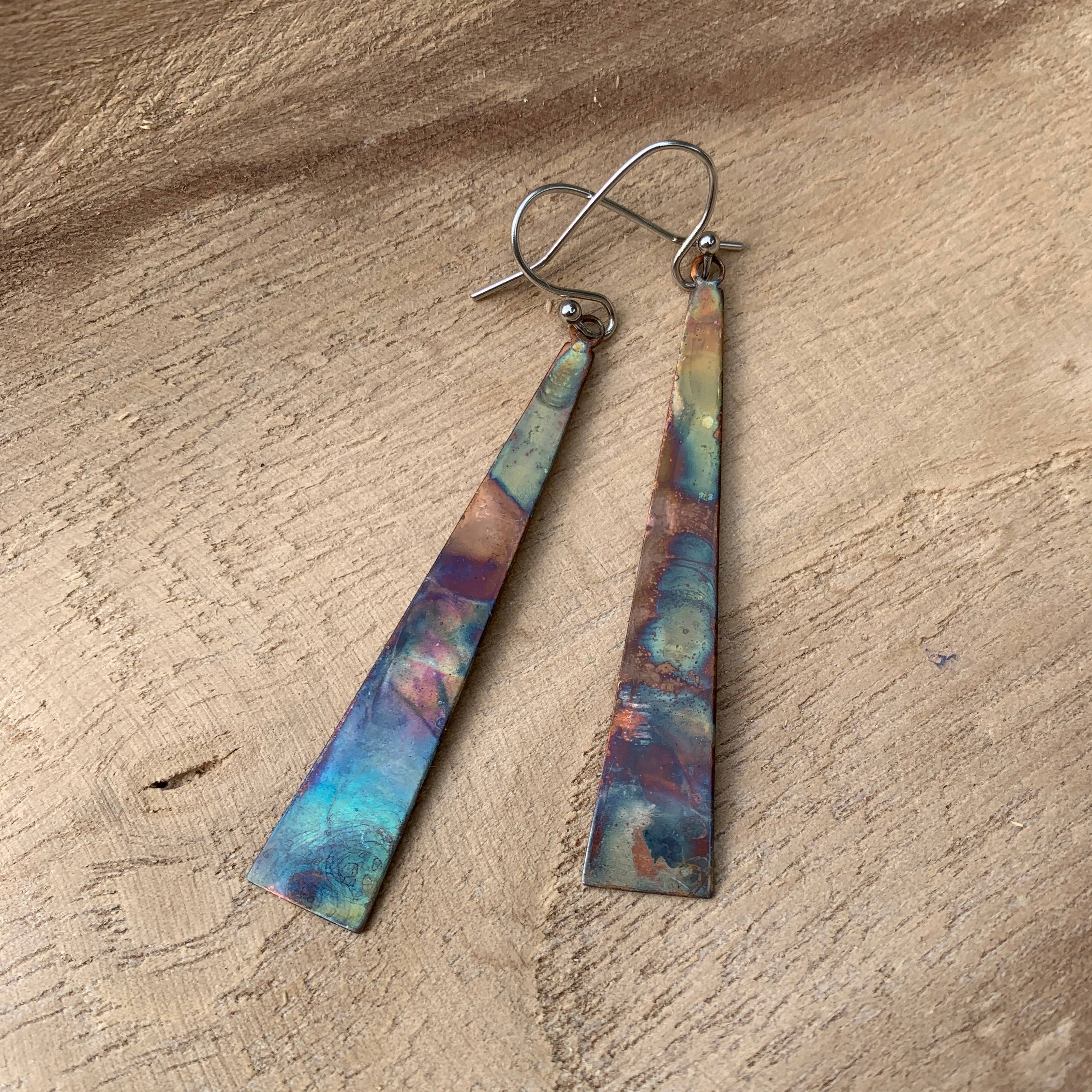 Close-up of Triangle Stick Earrings highlighting intricate colors and shapes created by Positive Shine Jewelry.