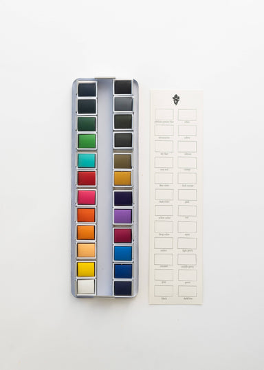 Close-up of the 24 Color Watercolor Paint Palette showing vibrant and richly pigmented colors ideal for blending and layering in various artistic projects.