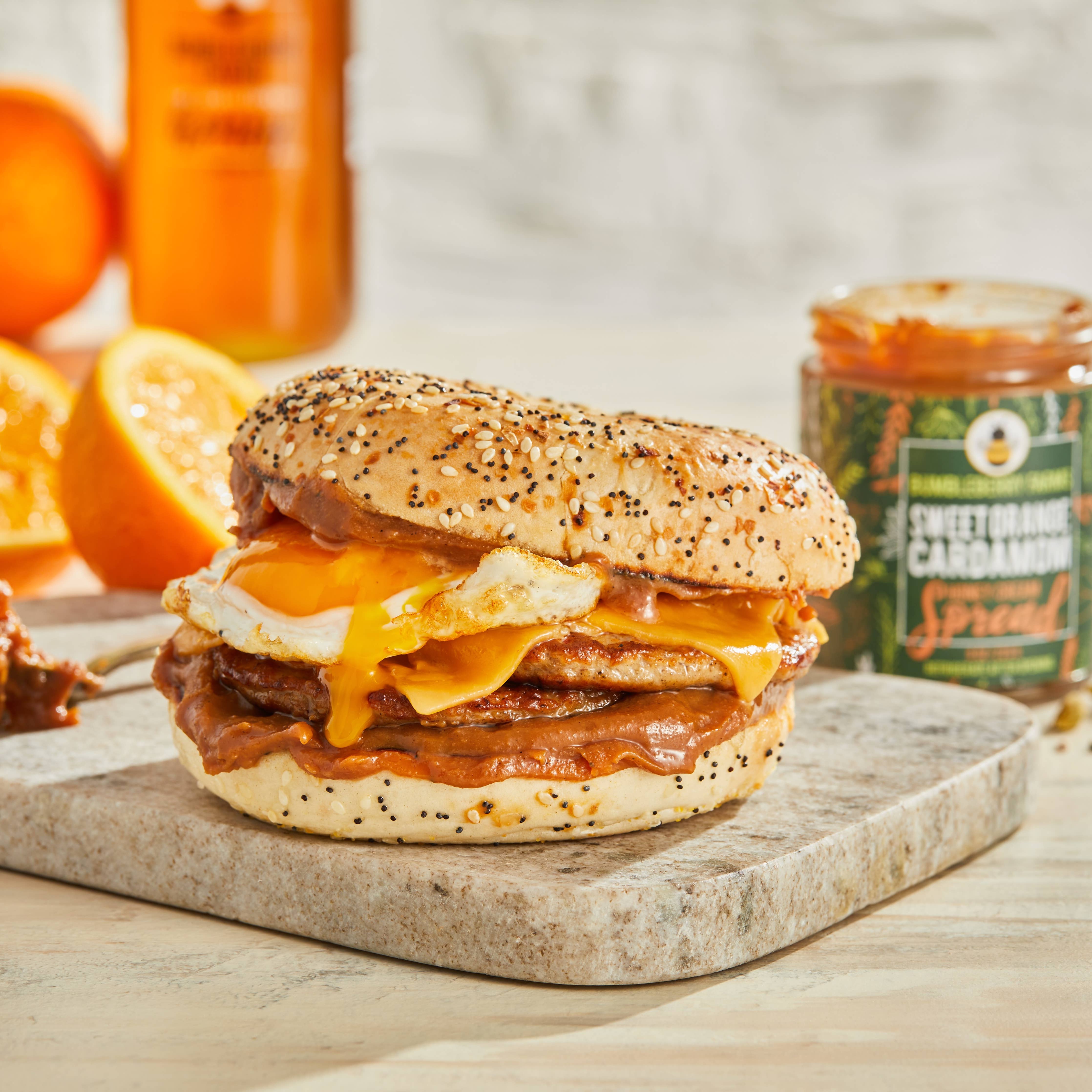 Sweet Orange Cardamom Honey Cream Spread on a breakfast sandwich