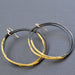 Striking Steel and Gold Heavy Gauge Hoops that are bold enough to make even the socks on your feet jealous!
