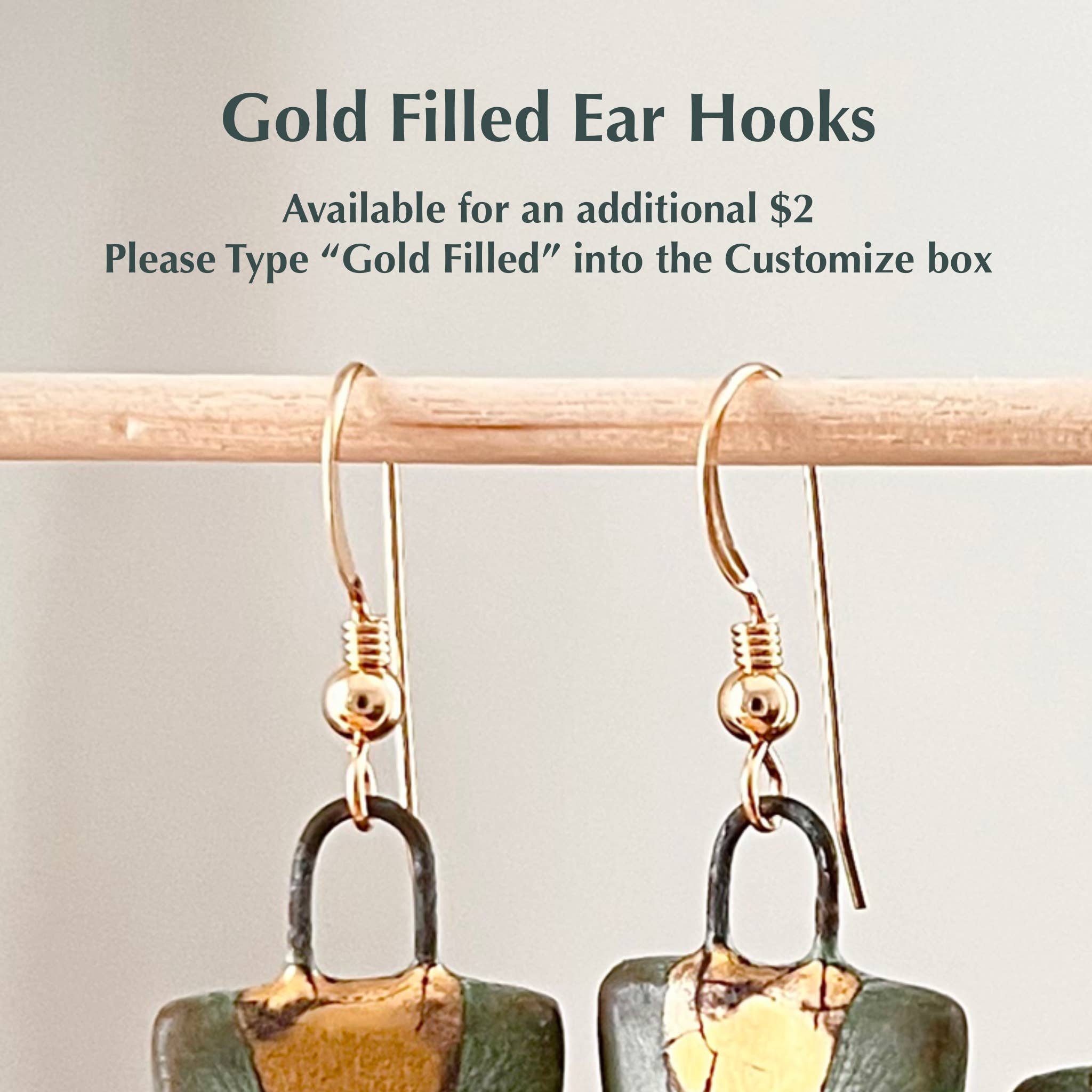 Gold Filled Ear Hooks displayed with Turquoise and Gold Collar Earrings by The Artifact House, providing an option for customization with a clear focus on the elegant design.