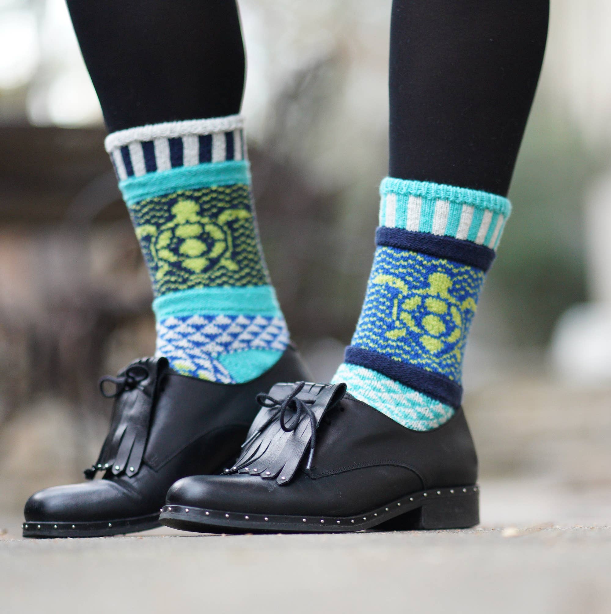 Ocean Crew Socks showcasing a beautiful pattern with Navy blue highlights, part of the Give Back Collection.