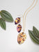 Close-up of the Eccentric Elm Earrings featuring 18K gold-plating and a stunning leaf design that could make Mother Nature weep tears of joy!