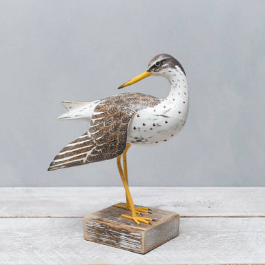 Handmade wooden Spotted Sandpiper by Aviologie, showcasing intricate carvings and hand-painted details, mounted on a rustic wooden base.