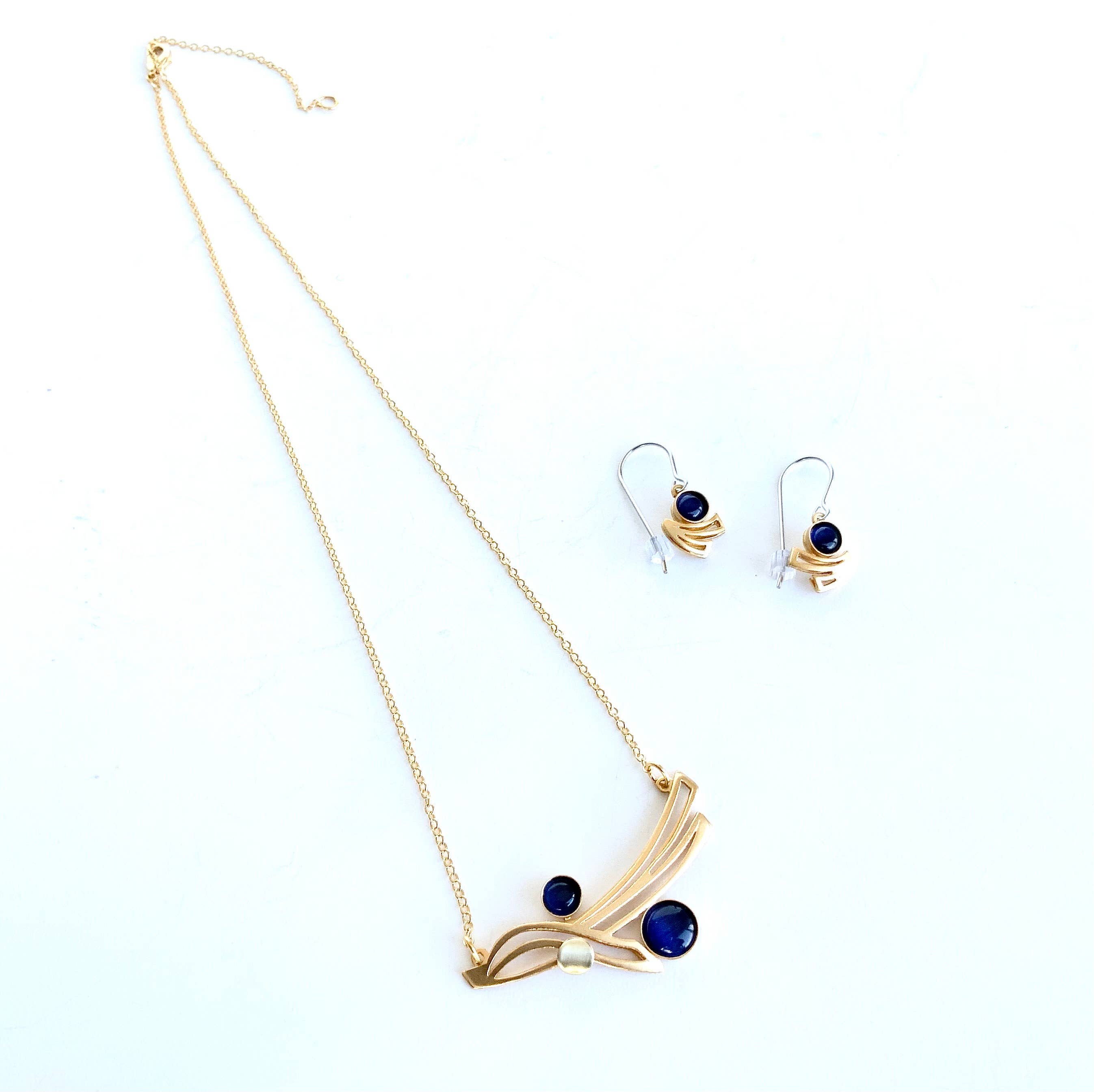 steel jewelry with blue gemstones
