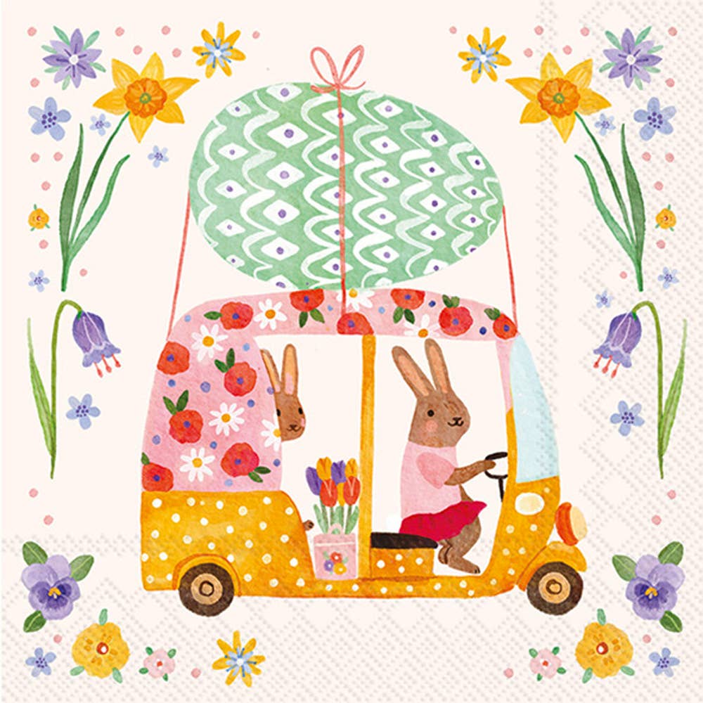 Charming Tuk Tuk Bunnies Paper Cocktail Napkins featuring playful bunnies in a colorful tuk-tuk surrounded by flowers, ideal for spring gatherings and celebrations.