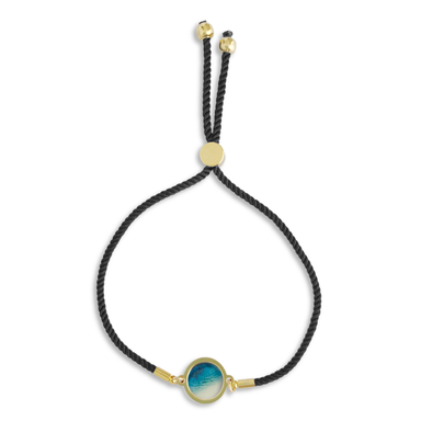 Slide Bracelet - Rise With The Tide: Black / Gold Plated by Foterra Jewelry featuring a vibrant nylon cord and a decorative circular gold-plated bead.