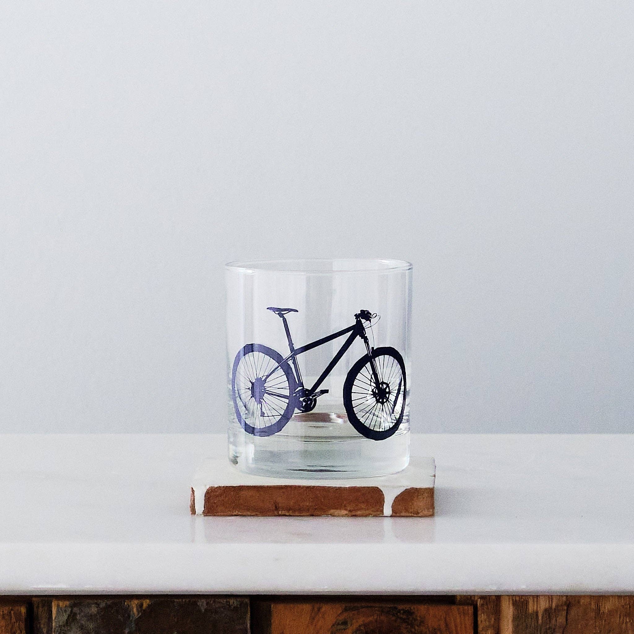 Colorful Mountain Bike Rocks Glasses displayed, ideal for enjoying drinks during outdoor adventures.