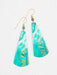 Gaya Earrings by Holly Yashi: Dangle earrings that measure 3 inches in length and 7/8 inches in width, this niobium beauty flaunts a striking green hue and gold-filled ear wires, perfect for adding a pop of color to any outfit – because who doesn’t want their ears to sparkle with style!