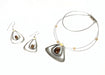wire necklaces and earrings featuring yellow beads and acrylic gemstones
