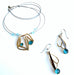 wire necklaces and earrings featuring blue beads and acrylic gemstones