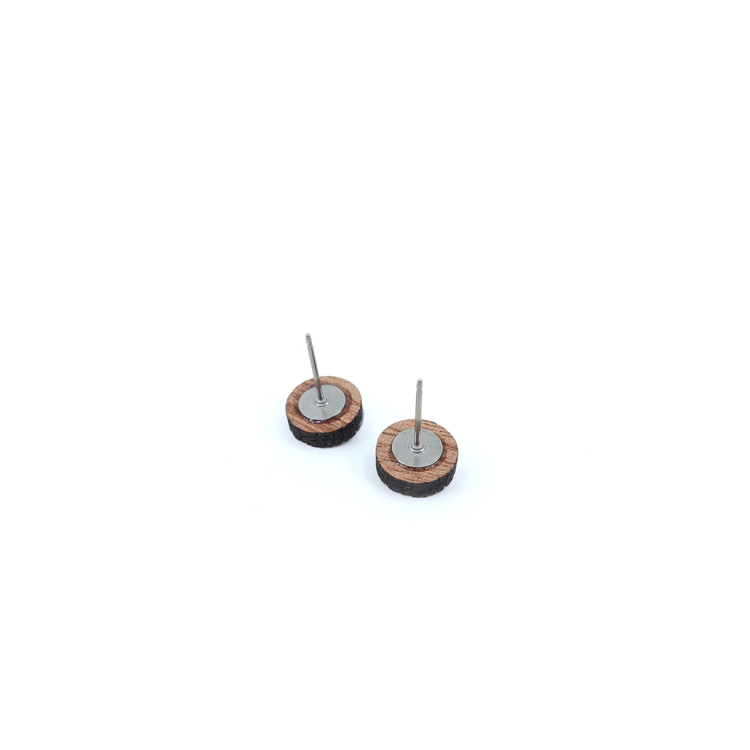 Artistic view of mini geometric color block titanium studs, crafted with care from premium materials.