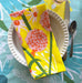 Stack of Allium Napkins, highlighting the quality screen printing on soft cotton, ideal for any occasion.