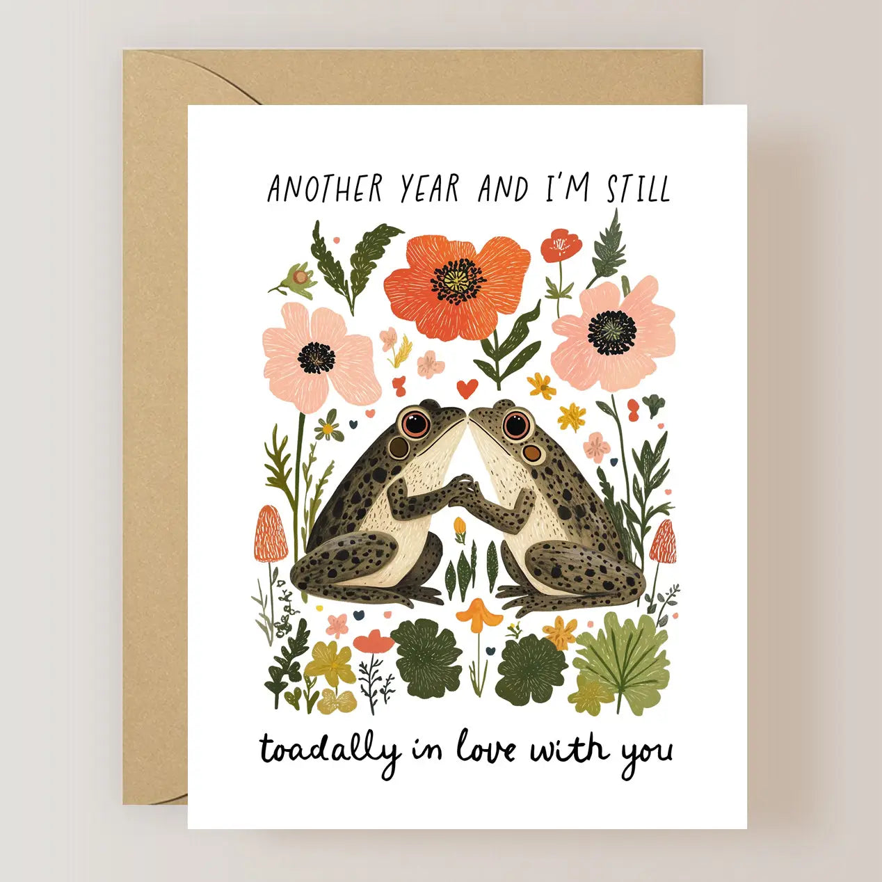 Firefly Paper Studio Card Collection presenting a charming card depicting two frogs among vibrant flowers, with the message 'toadally in love with you', ideal for romantic occasions.