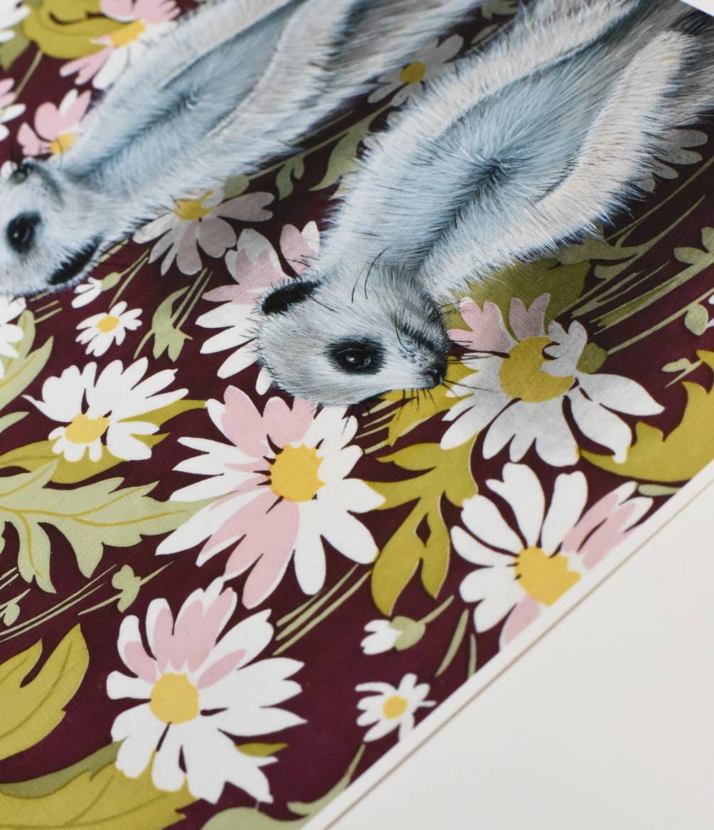 Close-up view of the floral pattern and meerkats illustration from Emily Uchytil's fine art print, emphasizing the artwork's texture.