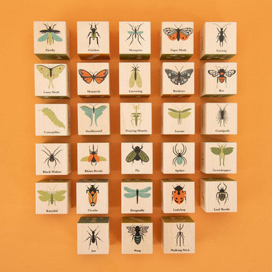 A playful display of Uncle Goose Bug Blocks featuring an artistic bug design and colorful lettering; the ultimate blend of fun and sophistication!
