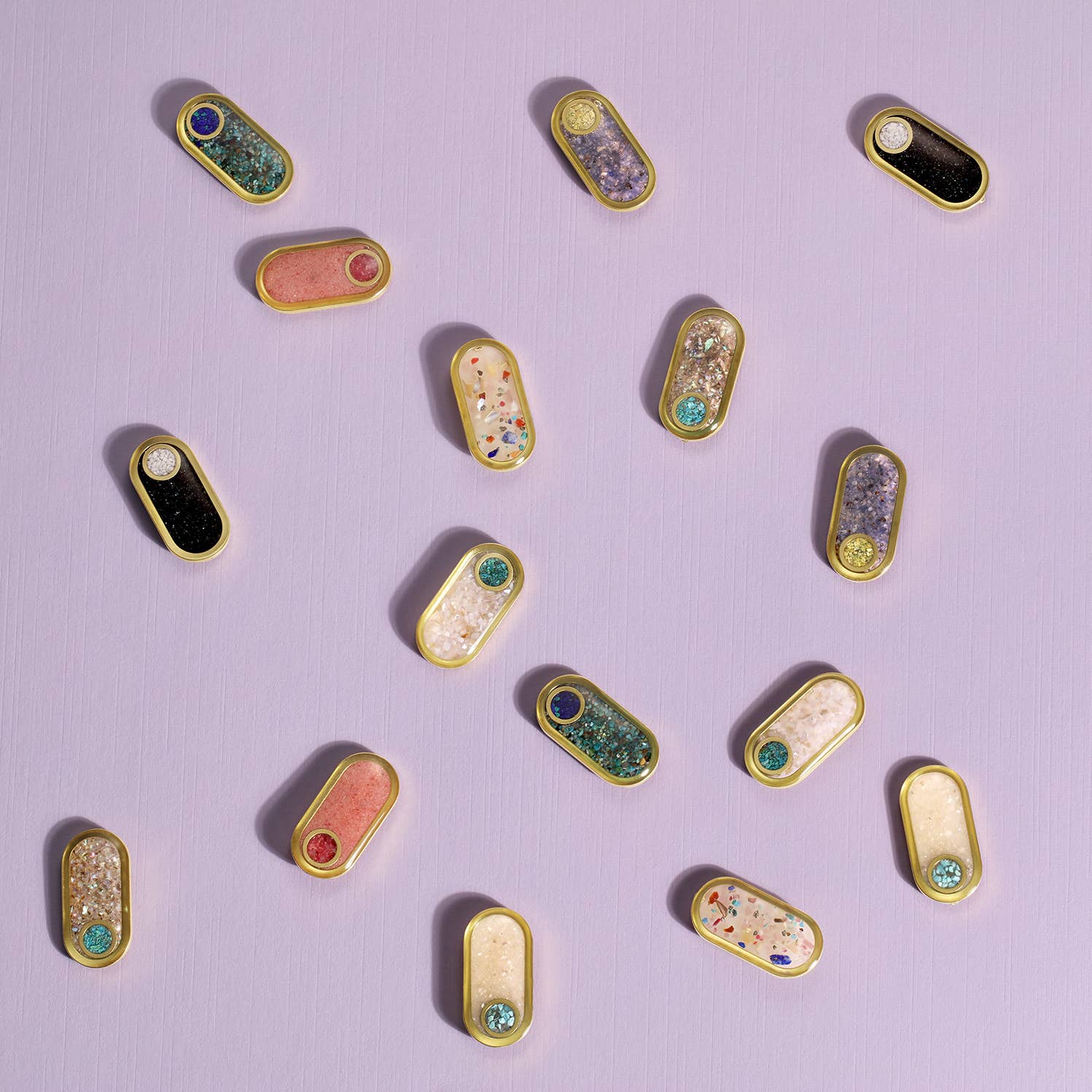 The Ellipse Earrings with crushed stone oval and round inlay